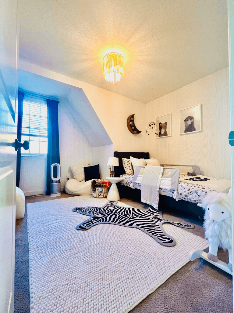 kids bedroom with zebra carpet